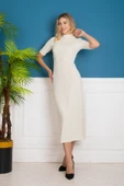 KREM YUVARLAK YAKA ÜSTE OTURAN FİTİLLİ MİDİ BOY ELBİSE thumbnail 3