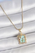 316L Çelik Gold Renk Zincir Mavi Mineli Çiçek İşlemeli Zirkon Taşlı Kelebek Detay Portre Model Kadın Kolye thumbnail 1