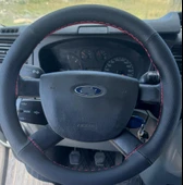 DİKİŞLİ DİREKSİYON KILIFI SİYAH DERİ NOKTALI DERİ KIRMIZI DİKİŞLİ F.OR.D TRANSİT İÇİN thumbnail 1