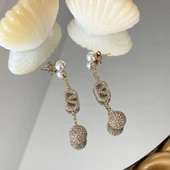 İnci Sallantılı Gold Çelik Küpe thumbnail 1