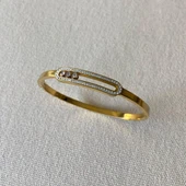 Hareketli Taşlı Gold Çelik Kelepçe thumbnail 1