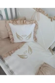 Ege Home Deluxe 4 parça melek kanadı nakışlı fırfırlı bebek nevresim takımı bej thumbnail 1