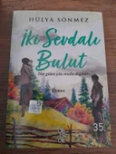 İki Sevdalı Bulut "Her Gülen Yüz Mutlu Değildir" (Sahafiye Kitap) - 1