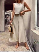 Kadın Bisiklet Yaka Kolsuz Bluz Ve Bol Paça Aerobin Kumaş Ikili Takım thumbnail 1