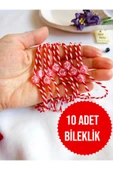 10 ADET UÇUK PEMBE BONCUKLU MARTENİÇKA BİLEKLİK ŞANS ARKADAŞ SEVGİLİ EŞ ÇOCUK HEDİYE BAHAR BİLEKLİĞİ thumbnail 1