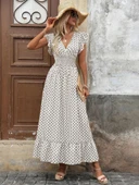 Kadın Kısa Kelebek Kollu Kruvaze Yakalı Desenli Süprem Elbise thumbnail 4