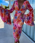 Kadın Göğüs Dekolteli Kolları Volan Detay Astarlı Tül Elbise thumbnail 1