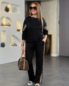 Kadın Kapüşonlu Leopar Detay Sweat Ve Yüksek Bel Yanları Leopar şeritli Bol Paça Pantolon Ikili Takım thumbnail 1