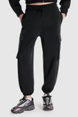 New Balance Lifestyle WNP1529-BK Siyah Kadın Eşofman Altı - 1