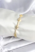 Pirinç Gold Renk Halley Yıldız Model Kadın Bileklik - EBJ250927W38030 thumbnail 1