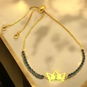 Harfe Özel Zincirli 14 Ayar Altın Plakalı Taç Figürlü Mavi Taş Desenli Hediye Bileklik-466 thumbnail 1