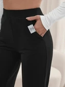 Kadın Yüksek Bel Cepli Geniş Kesim Ithal Krep Pantolon thumbnail 4