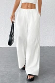 Kadın Beyaz Bol Kesim Cepli Geniş Paça Dökümlü Pantolon thumbnail 5
