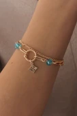 Tahtakale Toptancı Gold Renk Yonca Figür Mavi Kristal Boncuk Detay Kadın Bileklik 4759 - 1
