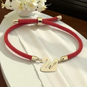 14 Ayar Altın Plakalı İsme Özel Kuğu Kuşu Figürlü Turuncu İpek Örgülü Hediye Bileklik-608 thumbnail 1