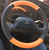 DİKİŞLİ DİREKSİYON KILIFI TURUNCU DERİ SİYAH DERİ SİYAH DİKİŞLİ FOTODAKİ TEMSA PRESTİJ İÇİN thumbnail 1