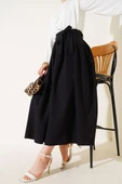 Pileli Kuşaklı Kloş Etek Siyah thumbnail 1