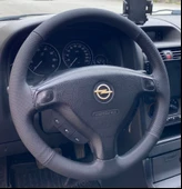 DİKİŞLİ DİREKSİYON KILIFI SİYAH DERİ NOKTALI DERİ SİYAH DİKİŞLİ OPEL ASTRA İÇİN thumbnail 1