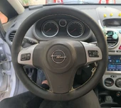 DİKİŞLİ DİREKSİYON KILIFI SİYAH DERİ BEJ DİKİŞLİ OPEL CORSA D İÇİN thumbnail 1