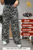 Kadın Pamuklu Dokuma Desenli Bol Kesim Geniş Paça Pantolon thumbnail 1