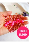 10 ADET PEMBE(FUŞYA) BONCUKLU MARTENİÇKA BİLEKLİK ŞANS BEREKET ARKADAŞ SEVGİLİ EŞ ÇOCUK HEDİYE BAHAR thumbnail 1