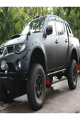 ROAL TUNİNG MİTSUBİSHİ L200 OFF ROAD DAKAR VİDA GÖRÜNÜM ÇAMURLUK DODİK SETİ 2007-14 MODELLER İÇİN UYUMLU thumbnail 1