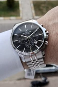 Daniel Klein DKISTE395 Fonksiyonları Aktif 2 Yıl Garantili Kadranı Siyah Kordonu Gümüş Renk Erkek Kol Saati thumbnail 1