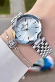 Daniel Klein DKISTE1018 Gümüş Renk Hediye Paketli Kadın Kol Saati ve Bileklik thumbnail 1