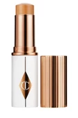 Charlotte Tilbury Unreal Skin Sheer Glow Tint 9 Tan - Nemlendirici Stick fondöten 8 ml - 1