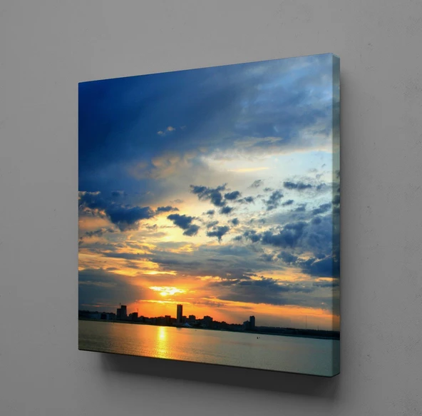 BULUTLU GÖKYÜZÜ ARASINDAN ÇIKAN GÜNEŞ KANVAS TABLO ürün görseli 1