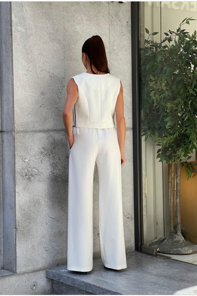 Trend Kadın Çoban Dikişli Yelek ve Pantolon Takımı ile Tarzınıza Zarif ve Hoş Bir Dokunuş Ekleyin - Resim 4