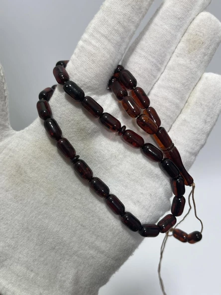 Doğal Kaya Damla Kehribar Tesbih 33lük 6x10,5mm 11 Gram ürün görseli