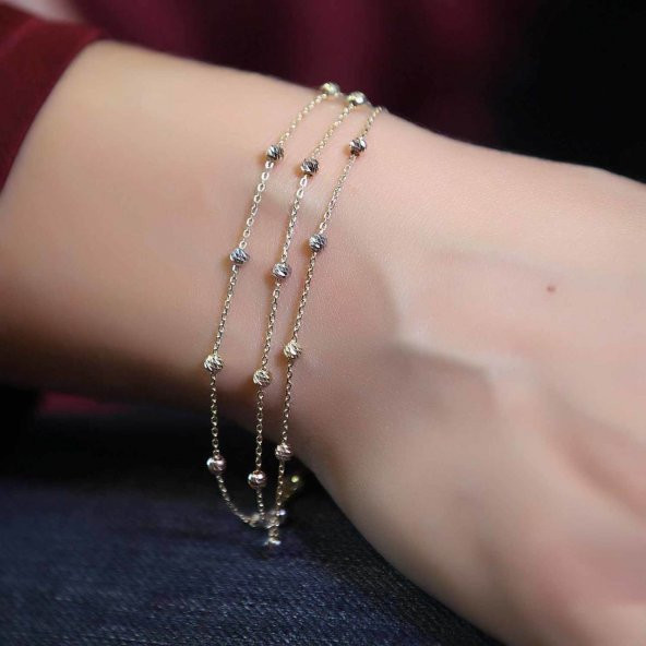 Dorika toplu üç sıralı altın bileklik ürün görseli