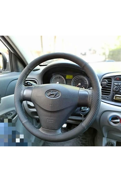 DİKİŞLİ DERİ DİREKSİYON KILIFI KARBON NUBUK SİYAH DİKİŞLİ HYUNDAİ ERA ürün görseli