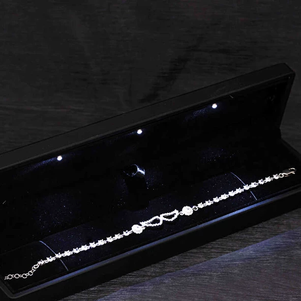 Gümüş Işıklı Kutulu Melek Kanadı Kadın Bileklik SL6531 ürün görseli