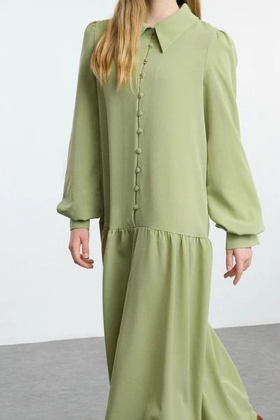 Moda Stil Relaxed Gömlek Yaka Maxi Boy Tesettür Eteği Fırfırlı Kaplama Düğme Detaylı Dokuma Elbise
