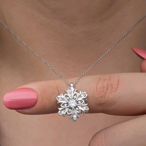 Gümüş Kar Tanesi Dönen Stres Kadın Kolye ürün görseli