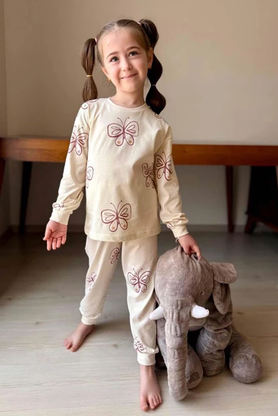 Kız Çocuk Bilekleri Manşetli Kelebek Desenli Krem Pijama Takımı ürün görseli