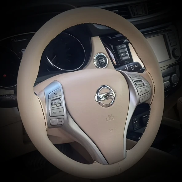 DİKİŞLİ DİREKSİYON KILIFI BEJ DERİ SİYAH DİKİŞLİ NİSSAN X-TRAİL İÇİN ürün görseli