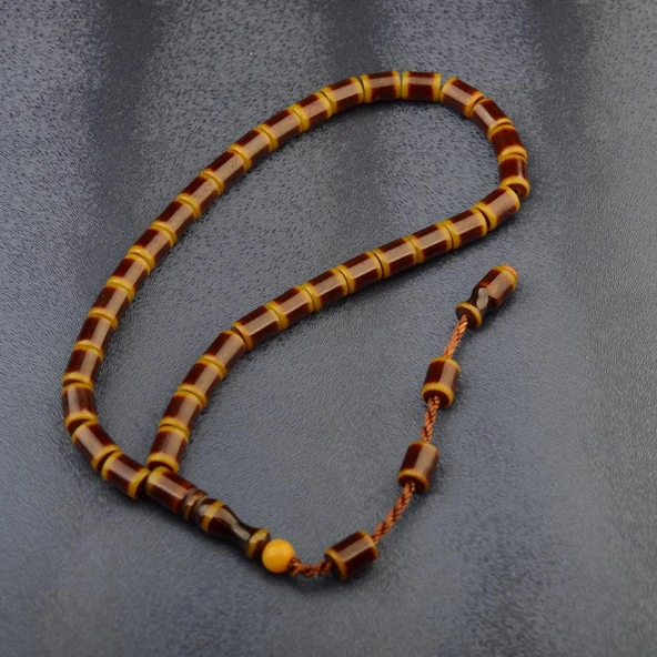 Sistem Püsküllü 10x7 mm Sıkma Kehribar Tesbih