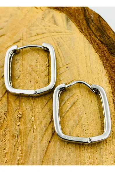 Gümüş Renk Figürlü Çelik  Küpe