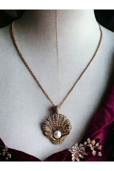 Deniz Kabuğu Figür Kolye ürün görseli