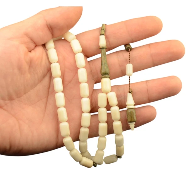 Kapsül Kesim 11x7 mm Pelesenk Ağacı Detaylı Sistem Püsküllü Narçıl Tesbih ürün görseli 1