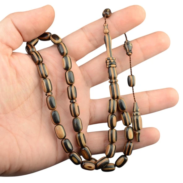 Kapsül Kesim 11x7 mm Kafur Ağacı Sistem Püsküllü Tesbih ürün görseli 1