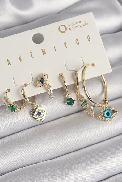 MuI MuI Pirinç Gold Renk Sallantı Zirkon Taşlı Göz Figür VIP Seri Kadın Küpe Seti