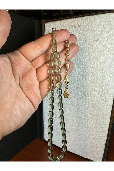 ATEŞ KEHRİBAR TESBİH 7MM X 11 KAPSÜL KESİM ŞEFFAF T-252