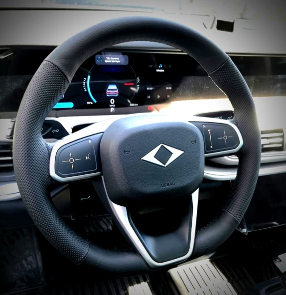 DİKİŞLİ DİREKSİYON KILIFI SİYAH DERİ NOKTALI DERİ SİYAH DİKİŞLİ TOGG İÇİN ürün görseli