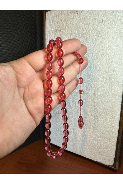 ATEŞ KEHRİBAR TESBİH PEMBE RENKLİ ŞEFFAF BEYZİ KESİM HEDİYE 7MM X 11 MM T-267
