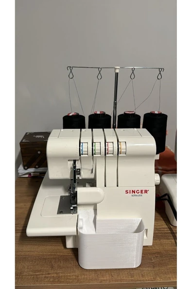 SİNGER Singer marka overlok makinası artık kumaş haznesi