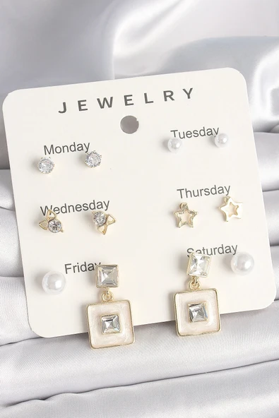 Pirinç Gold Renk Zirkon Taşlı Yıldız Figür Sallantı Beyaz Mineli Model 7'Li Kadın Küpe Seti